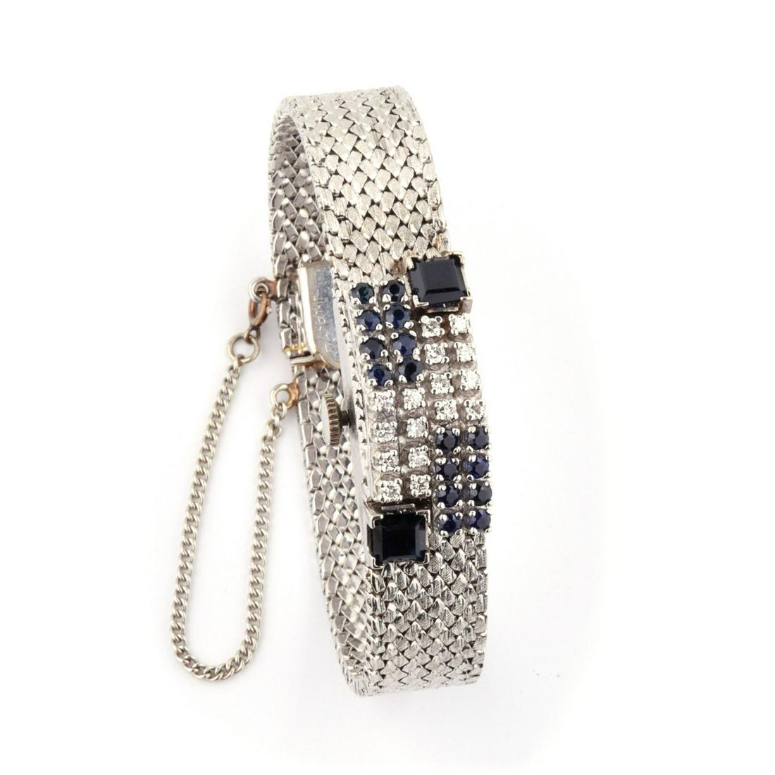 A 14K DIAMOND AND SAPPHIRE HIDDEN WATCH BRACELET (1 of 8)