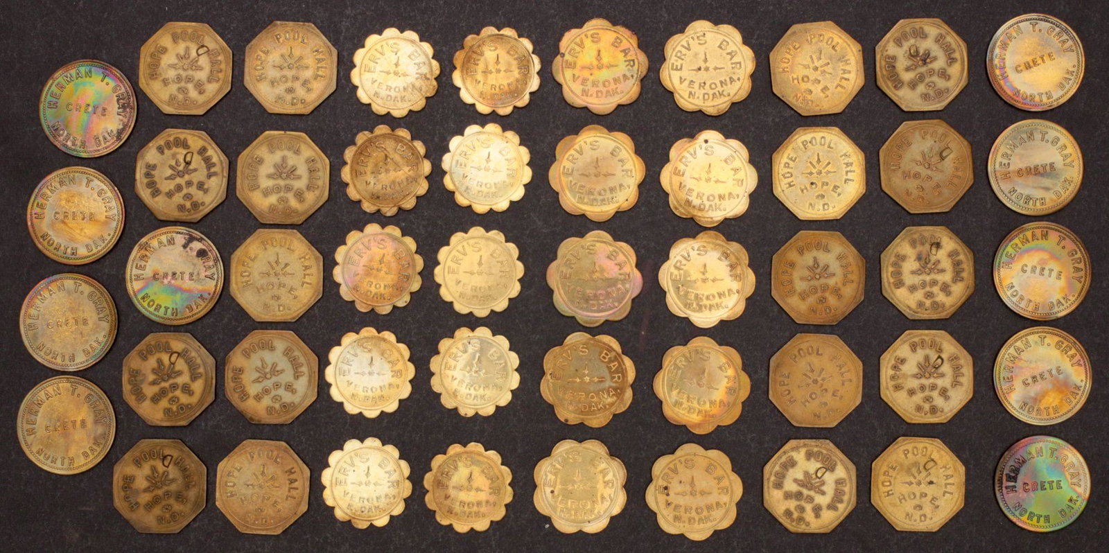 49 NORTH DAKOTA BAR AND POOL HALL TRADE TOKENS (1 of 2)