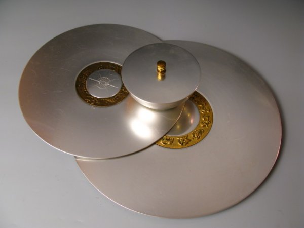KENSINGTON SPUN ALUMINUM ZODIAC TRAY, CARDINAL POINTS &: Includes an 18 inch diameter aluminum tray with applied brass zodiac center, a 15 inch tray with N, S, E, W cardinal points around center compass, and a 6.5 inch covered dish.