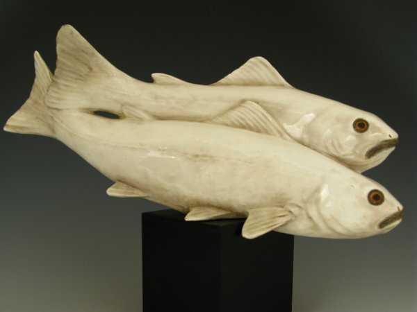 CACCIAPUOTI PORCELAIN FIGURE OF SWIMMING GAME FISH: 9.75 x 13.5 inches including wooden block mount, artist signed in the porcelain on reverse, plus a different name toa tag applied to bottom of wooden stand, numbered 956, made in Italy.