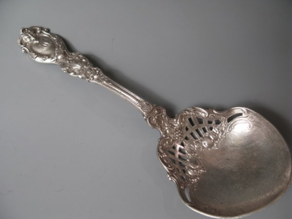 1875 HEAVY CAST GORHAM STERLING BERRY SPOON: A heavy, cast sterling silver berry spoon with Gorham's date mark for the year 1875 and an 'AW' monogram for Alison Wyeth, Measures 9", 146 g.