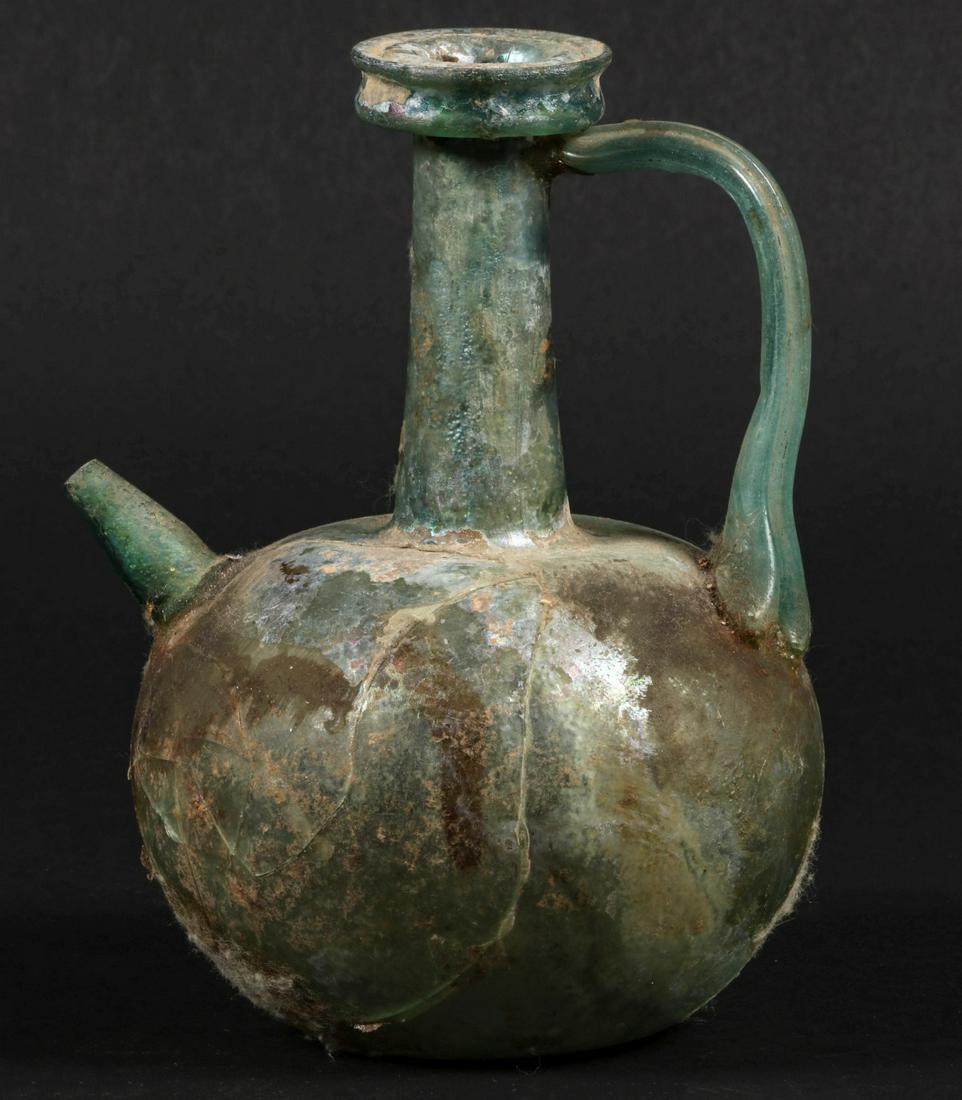 AN EGYPTIAN GLASS HANDLED JUG WITH SIDE SPOUT (1 of 13)