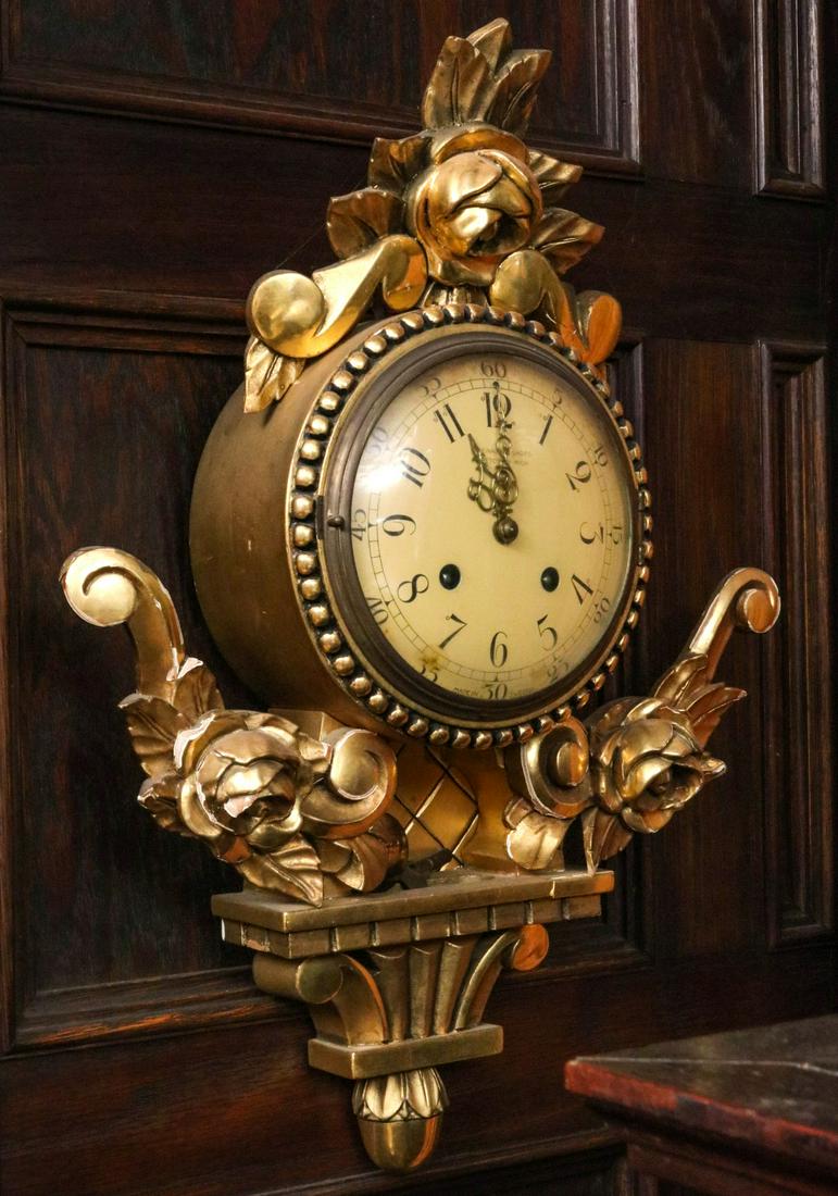 AN EARLY 20TH C CARVED AND GILT WOOD CARTLE CLOCK (1 of 10)