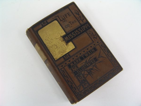 Twain. LIFE ON THE MISSISSISSIPPI: Twain, Mark. LIFE ON THE MISSISSIPPI. James R. Osgood and Company, Boston, 1883. Octavo., 626pp., First edition. Second printing. Pictorial brown cloth decorated in black and gilt. Corners and spine e