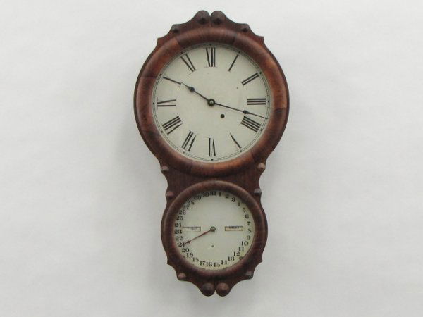 SETH THOMAS OFFICE #4 DOUBLE DIAL CALENDAR CLOCK: Time only, 8 day, rosewood case in original finish, measures 27.5 x 15 x 4.25 inches.