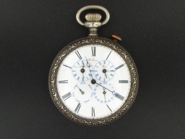 RARE TRIPLE TIME ZONE WATCH W/CALENDAR: PARIS, NY & LOC: A very unusual watch with dial indications for day, date, local time, Paris time and New York time. Unsigned plate movement looks to have a pallett escapement. Marked St. Louis on the dial (perhaps th