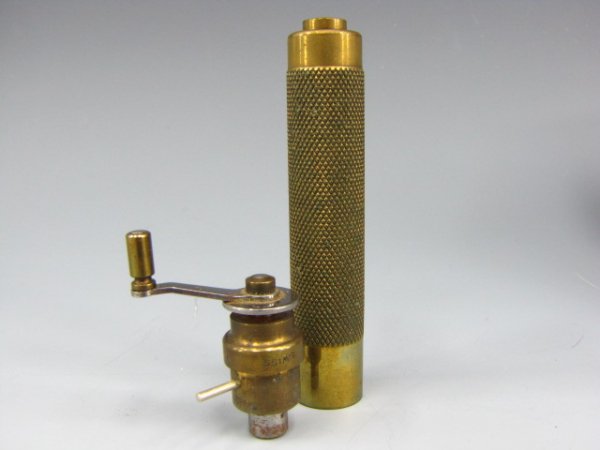 JULES BOREL WATCH MAKER'S MAINSPRING WINDER SET: Mainspring winder set with master handle and nine individual barrels. Sizes appear to range from 0 to 8. In hinged wooden case with reprinted Jules Borel advertising sheet. In 2 x 5 x 4 inch wooden ca