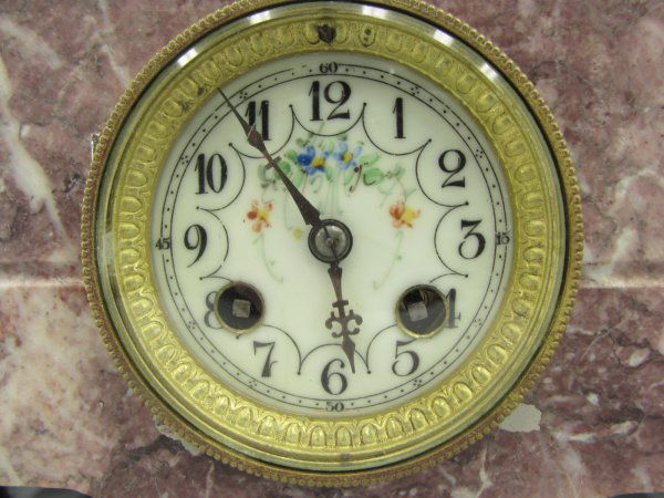 A 19TH C. FRENCH THREE PIECE CLOCK SET WITH STATUE: Red marble with spelter mounts and an Art Nouveau spelter maiden figure with impressed signature of J. Causse for Julien Causse (French born 1869), the movement is signed AD Mougin, time and strike, b