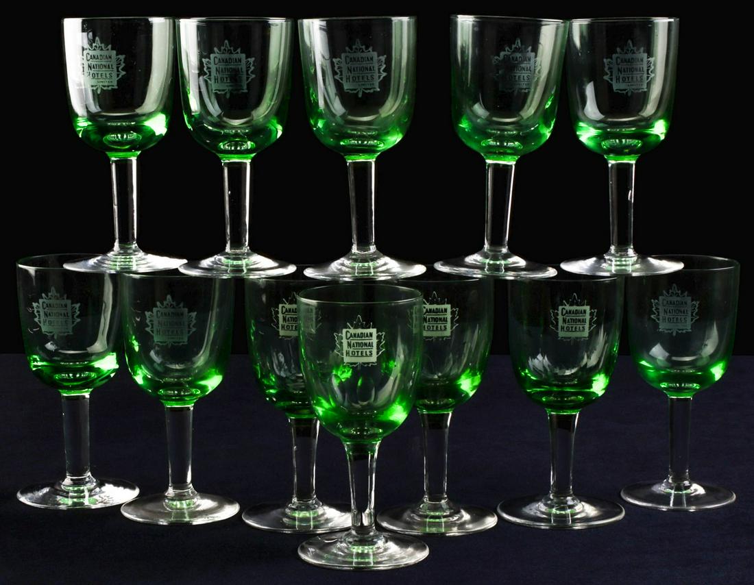 CANADIAN NATIONAL RAILWAYS FACETED GREEN CRYSTAL STEMS: The green bowl with acid etched Canadian National Hotels maple leaf logo, on clear stems, four bowls have vertical cut facets. Measure 5 inches each. We happily provide seamless in-house packing and s