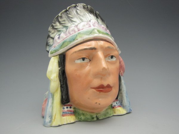 AUSTRIAN MAJOLICA FIGURAL INDIAN TOBACCO HUMIDOR: Multi-colored Indian head and feather headdress, measures 5 x 3.5 inches.