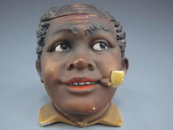AUSTRIAN FIGURAL BLACK AMERICANA HUMIDOR: Balding black figure smoking a pipe. Measures 4.5 x 3.75 inches.