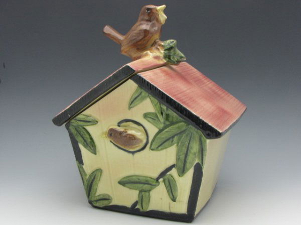 McCOY WREN HOUSE COOKIE JAR: McCoy Wren House Cookie Jar is marked "McCoy USA", (1960), measures 7" x 7.5".