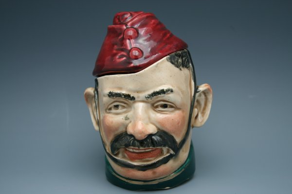 MAJOLICA AUSTRO-HUNGARIAN SOLDIER HUMIDOR: Unmarked, stands 5 inches.