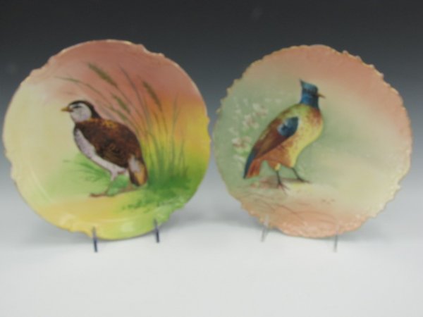 TWO ANTIQUE LIMOGES FISH PLATES: One Limoges Coronet artist signed, scalloped thin gilt border, 10-1/8 inches diameter; another with shaped gilt border, green mark on verso