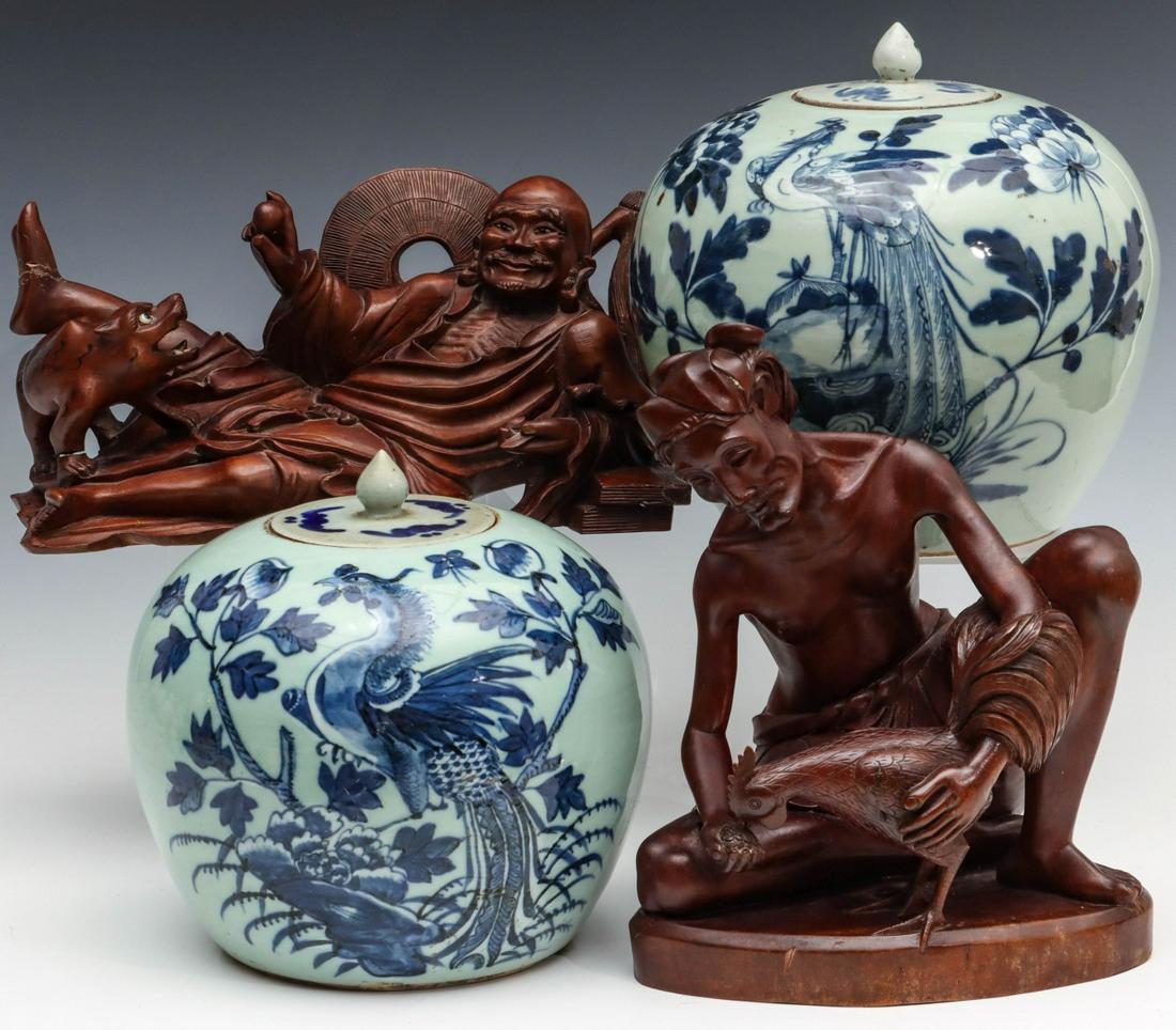 CHINESE CELADON AND BLUE GINGER JARS AND WOOD CARVINGS: The celadon ground jars with cobalt blue decoration of phoenix birds, matching covers with bats in blue. Plus two wood carvings as shown. Jars measure 8.5 x 9 and 9.5 x 9.5 inches. Figures are 6.5 and