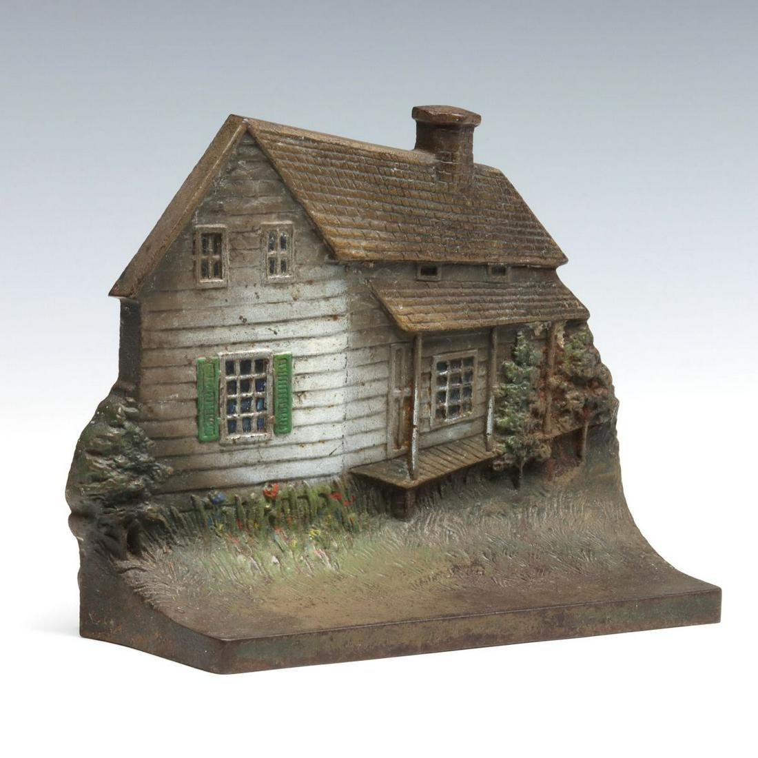 BRADLEY & HUBBARD HOUSE OF EDGAR ALLEN POE DOORSTOP: The polychrome painted doorstop 'Real Life Home of Edgar Allen Poe,' cast mark of B&H back side. Measures 6 x 8 x 3 inches. We happily provide seamless in-house packing and shipping services on ne