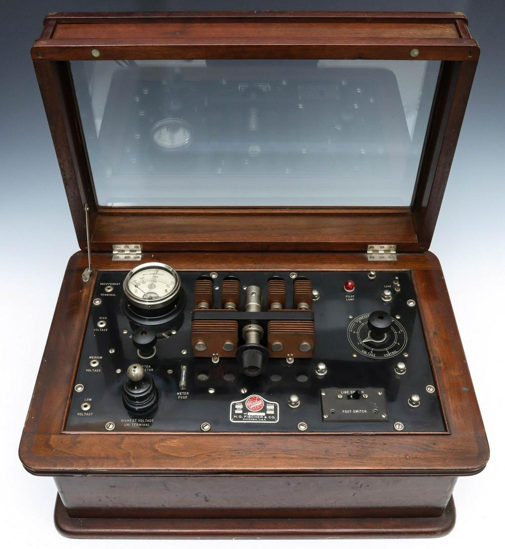 H.G. FISCHER & CO SPARK GAP DIATHERMY MACHINE TYPE G2: The H.G. FISCHER & CO. spark gap electrotherapy diathermy machine of questionable medical merit in mahogany cabinet. model Type G2 Model, 60 Cycle, 110 Volt, 5 amp, with glazed glass cover. Measures 1