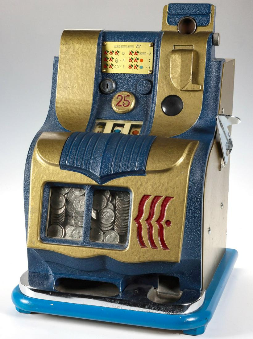 A SCARCE MILLS 'HASH MARK' 25 CENT SLOT MACHINE C. 1947: The miniature three reel Blue and Gold Mills 'Hash Mark' QT slot machine with upper coin turret, original score card, original reels, original blue crinkle surface and gold enamel paint with original