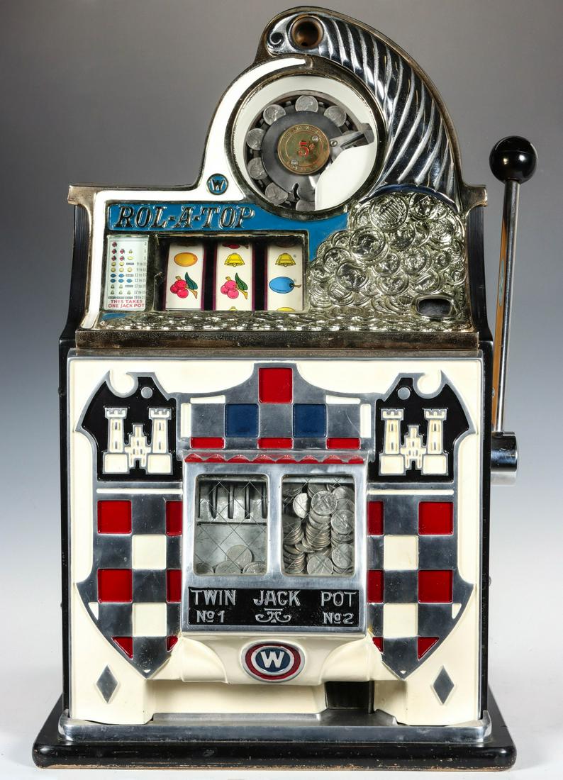A REPRODUCTION WATLING ROL-A-TOP 5 CENT SLOT MACHINE: The good clean machine as shown. Complete with key. Due to the laws regulating the sale of slot machines, we will not sell or ship to residents of Alabama, Connecticut, Hawaii, Indiana, Nebraska, Sout