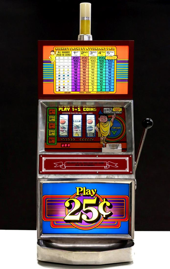 A CAESARS 25 CENT ELECTRONIC SLOT MACHINE: The electronic model circa 1979 as shown. Complete with keys. Due to the laws regulating the sale of slot machines, we will not sell or ship to residents of Alabama, Connecticut, Hawaii, Indiana, Nebr