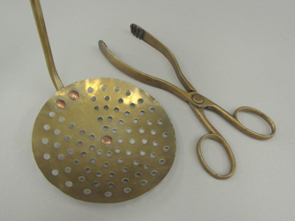 BRASS SKIMMER AND TONGS: Nice pair; large form skimmer with 5.75 inch diameter bowl, 15 inch length with looped end for hanging storage; plus a pair of 10 inch scissors form tongs.