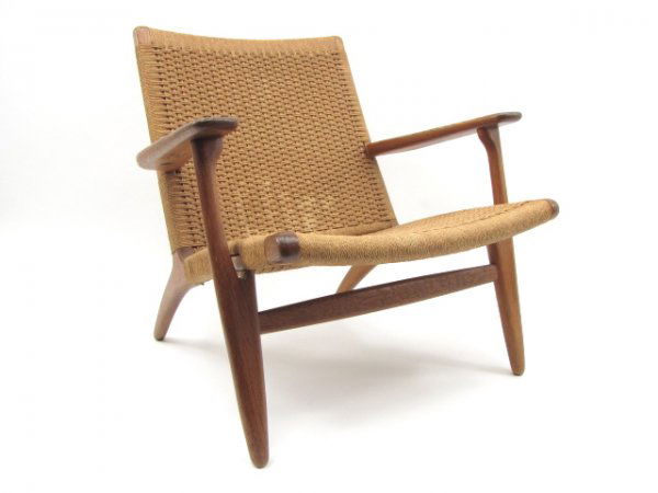 HANS WEGNER (1914 - 2007) EASY CHAIRS CH25: Four oak chairs designed by Hans Wegner 1951 and manufactured by Carl Hansen & Søn, Odense Denmark. Each with branded mark under the right arm reads "Made In Denmark by Carl Hansen and Son, Odense, D