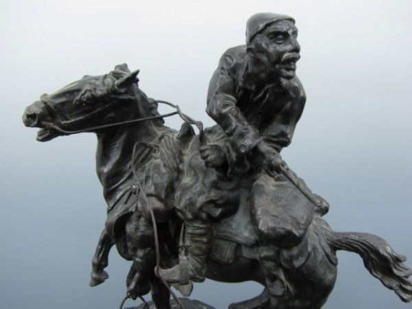 AFTER VASILI GRACHEV (1831-1905) BRONZE SCULPTURE: "Ukrainian Rustler" after Grachev, also known as Ivanovitch Grechov, Russian (1831-1905), see "Bronzes: Sculptors & Founders, 1800-1930, Volume Three," p. 749, 11-1/2 inches tall, 12 x 4-1/2 inch, on