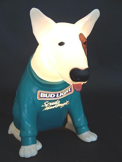 SPUDS MACKENZIE BUD LIGHT BEER LIGHTED ADVERTISING: With Spuds name on his sweater. Good condition. Flashes on and off. 15 inches high.
