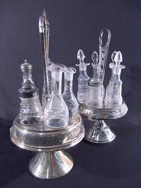 TWO FANCY VICTORIAN SILVERPLATE 5 BOTTLE CASTOR S