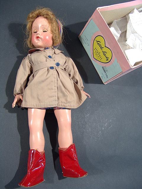 30'S EFFANBEE 18 INCH LITTLE LADY COMPO DOLL: ORI: 30'S EFFANBEE 18 INCH LITTLE LADY COMPO DOLL: ORIG BOX Original box and clothes, hang tag and brass heart, all over crazing, two extra dresses