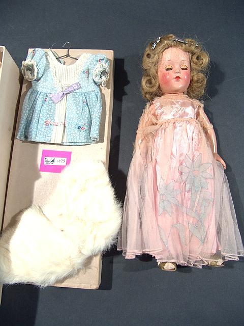40'S EFFANBEE ANNE SHIRLEY COMPO DOLL IN ORIG BOX: 40'S EFFANBEE ANNE SHIRLEY COMPO DOLL IN ORIG BOX Good condition, net dress over the satin is brittle and deteriorating, satin dress is still good, sturdy. Crazing to compo face and eerie cataracts to