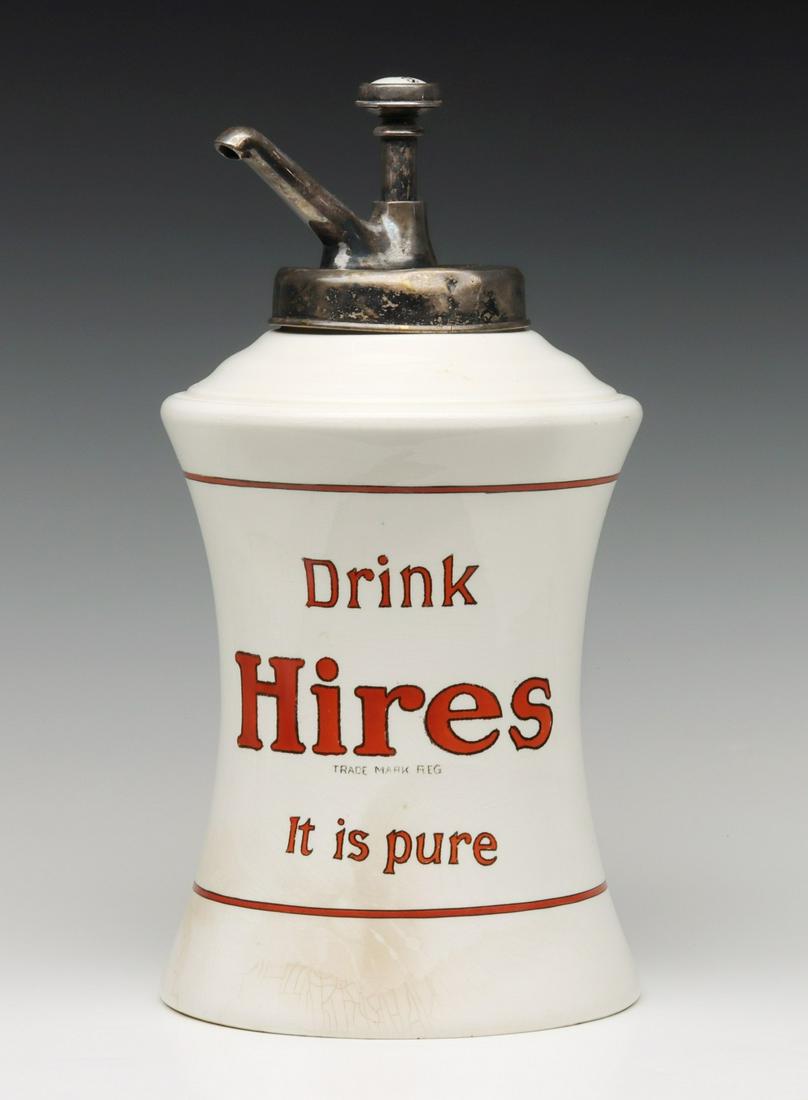 A HIRES ROOT BEER SODA FOUNTAIN SYRUP DISPENSER: The syrup dispenser for Hires Root beer, original lid with pump branded Hires, the white ceramic container reads 'Drink Hires, It is pure' in red and black on each side, signed The Charles E. Hires Co