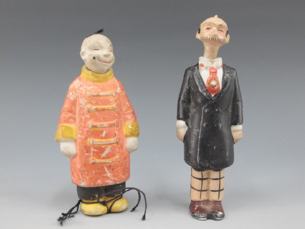 TWO GERMAN BISQUE NODDER CARTOON CHARACTERS: Includes Uncle Bim of 'The Gumps,' stands 4 inches tall, and Ching Chow, 3.5 inches tall. Both named to reverse and 'Germany' incised in the hem of their coats.