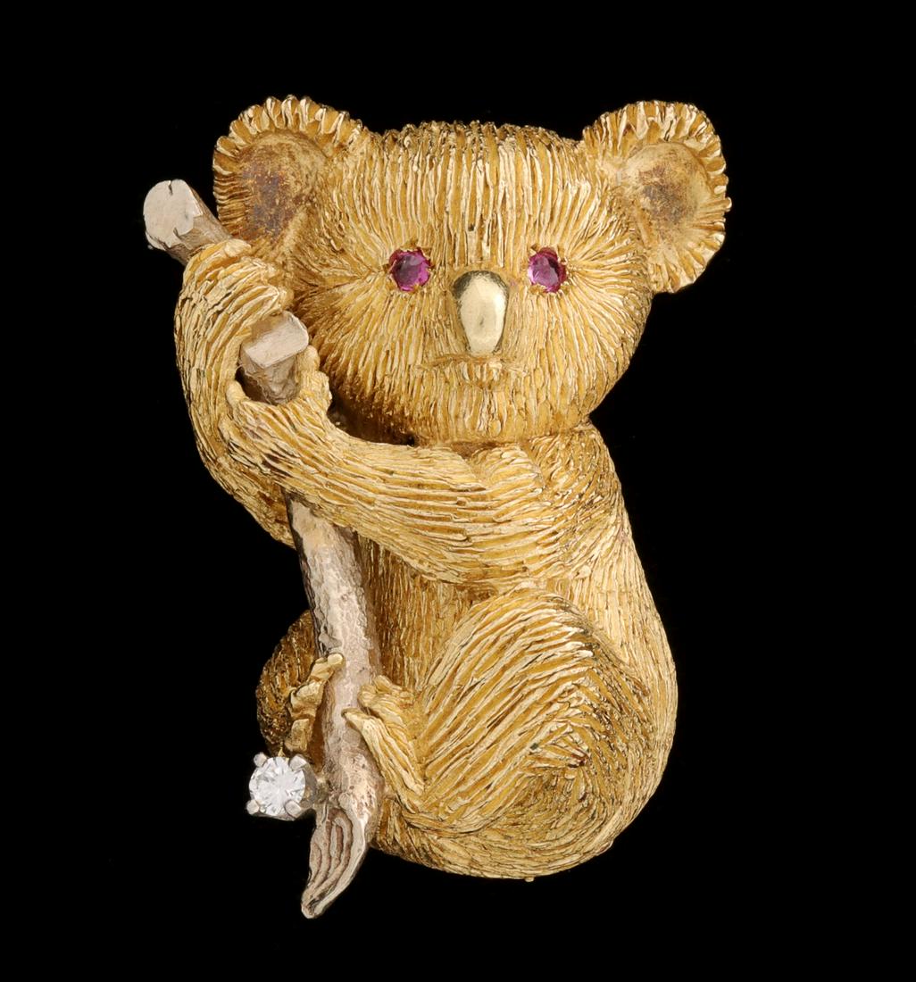 AN 18K GOLD KOALA BEAR BROOCH WITH RUBIES AND DIAMOND (1 of 9)