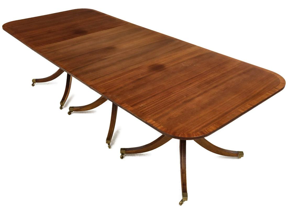 A REGENCY STYLE TRIPLE PEDESTAL MAHOGANY BANQUET TABLE (1 of 18)