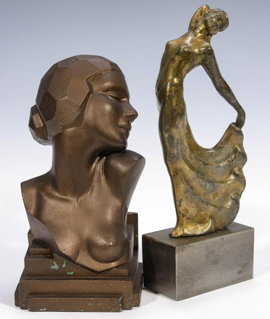 ART DECO PERIOD FEMALE FIGURAL ACCESSORIES CIRCA 1930: The white metal female bust with 1930s coiffure in dark brown patination displays cubist influence design and is paired with the figure of a dancer in oxidized finish on metal plinth. Neither example 