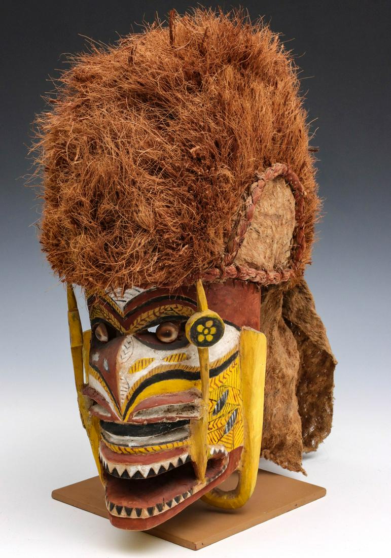 A 20TH C. NEW IRELAND TATANUA DANCE MASK WITH FIBER (1 of 10)