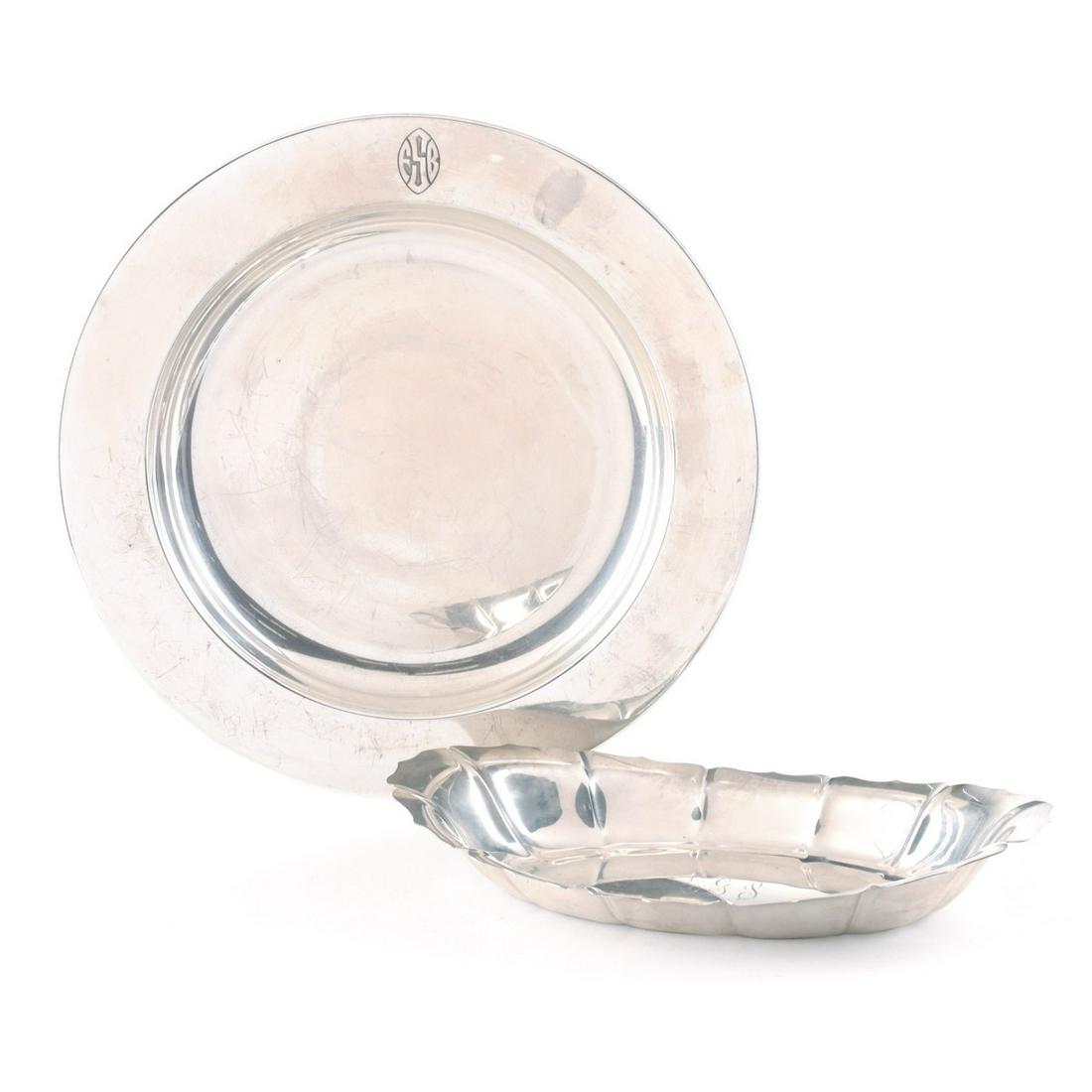 TWO STERLING SILVER TRAYS WITH MONOGRAM: The two examples as shown signed Lunt and John Coburn. Measure 2 x 12 x 6.5 and 1 x 13 inches. Total weight 39.20 ozt. Provenance: The estate of Morton and Estelle Sosland. In Kansas City, the Sosland