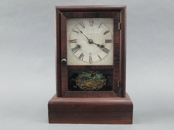 A SETH THOMAS ANTIQUE COTTAGE CLOCK