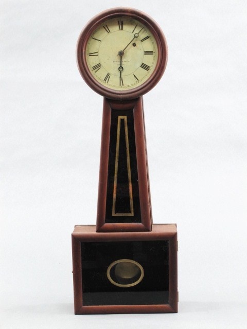 A HOWARD AND DAVIS BOSTON BANJO CLOCK NO. 4: A nice example in unusual cherry case, original dial measures exactly 7.5 inches diameter, 29 x 10 x 4 inches. Pendulum and weight present, original moon hands, restored throat and lower tablet, very 
