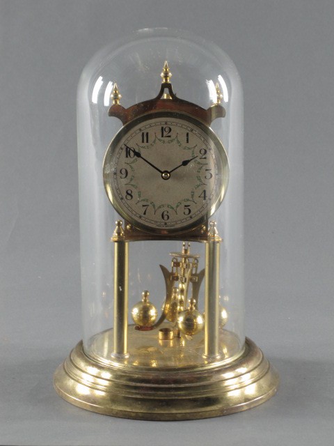 A GERSON COMPANY GERMAN ANNIVERSARY CLOCK: With engraved presentation, measures 12 x 8 inches round.