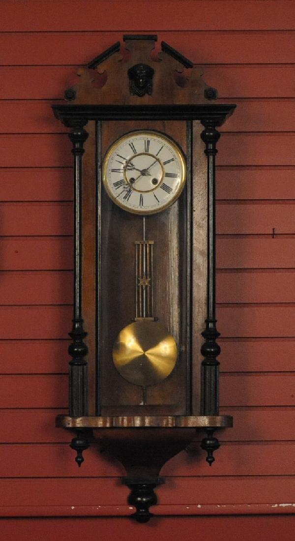 A GERMAN BOX REGULATOR WALL CLOCK: T/S, Nic double-sunk enamel dial, measures 42 x 15.5 x 6 inches, appears all original, a nice clock in good condition.