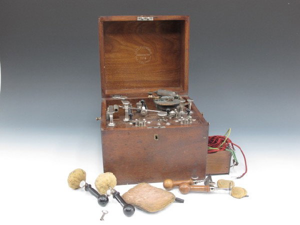 ANTIQUE MEDICAL 1885 FLEMMING FARADIC BATTERY NO 3: Includes electrodes, plates, wires, posts and ports, marked on top, 'The Flemming Battery, Phila Pat June 23, 85,' and 'Otto Flemming, Philadelphia Pa, Faradic-Battery, No 3.' Rich wood casing, measur