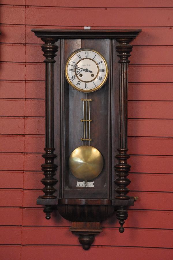 A GUSTAV BECKER WALL REGULATOR: A nice German box regulator signed Gustav Becker on the double-sunk enamel dial and on the movement as well, nice walnut case in original finish, measures 37 x 18 x 7 inches.