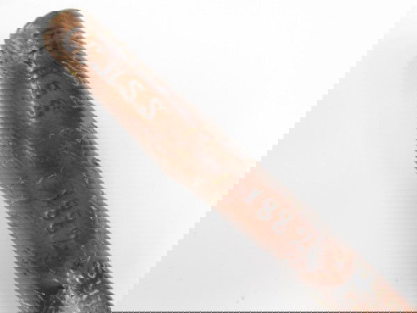 1882 CANE: MINNESOTA LAW STUDENT HUBERT HANSEN: A carved and inscribed souvenir walking stick dated 1882. The handle area reads, "Hubert Hansen S.U.I Law Department, A Souvenir of the Days of Auld Lang Syne, Class of 1882. According to History of S