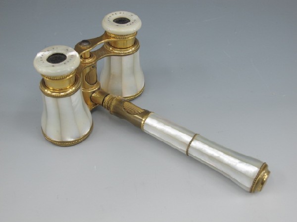 OPERA GLASSES WITH HANDLE, LEMAIRE FI, PARIS: 2 1/2" x 4" wide, 5" handle made of brass & covered with mother-of-pearl.