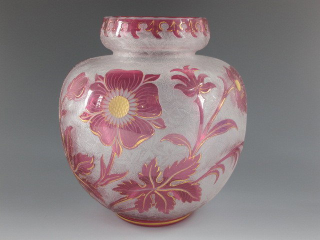 A ST. LOUIS FRENCH CAMEO GLASS VASE: Pink to red cameo relief decoration on textured ground, acid signature mark on pontil, identical form pictured on page 194 of Art Glass Nouveau by Ray and Lee Grover. Measures 6.5 x 6 inches.