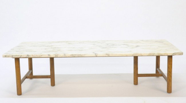 T.H. ROBSJOHN-GIBBINGS COFFEE TABLE FOR WIDDICOMB: Marble top on doweled base, metal signature tag, measures 14 x 54 x 24 inches.