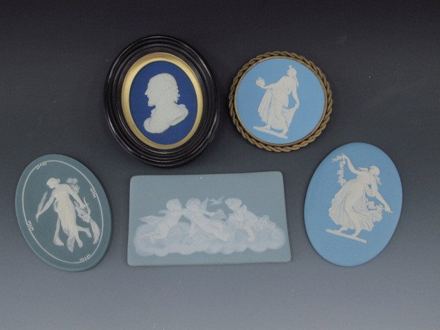 A GROUP OF BISQUE RELIEF CAMEO PLAQUES: Includes three Wedgwood (two marked Wedgwood J and Wedgwood N) plaques - 4.75 inch diameter, 6 x 4 inch oval, framed 6 x 5 inch oval, a Mettlach 6 x 4 inch oval, and a Limoges 4 x 6.5 inch rectangle.