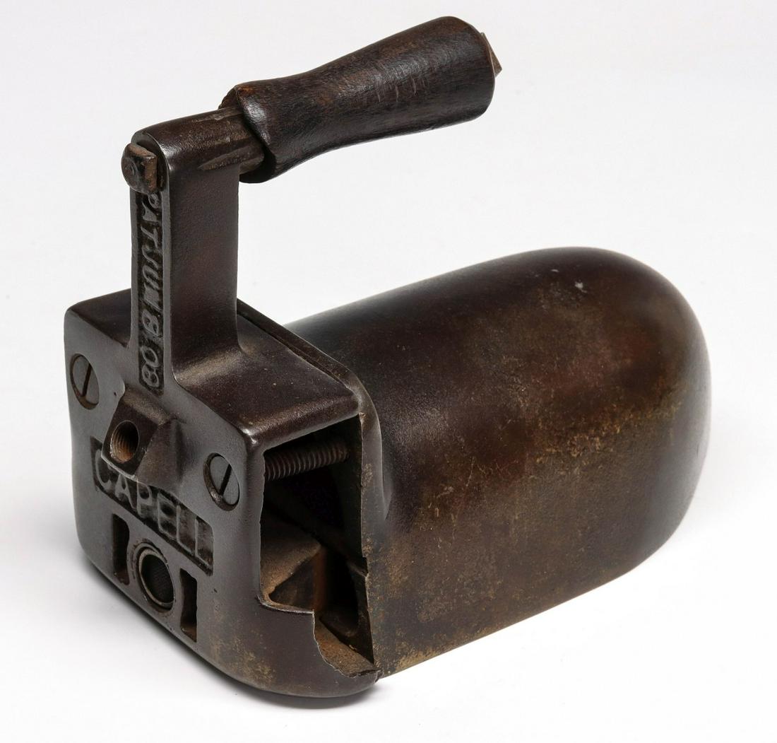 A CAPELL GAS IRON, CIRCA 1909: Signed CAPELL and patent dated Jun 8 09. Measures 5.5 x 7.5 x 3.75 inches. We happily provide seamless in-house packing and shipping services on nearly everything we sell. Until further notice, we can